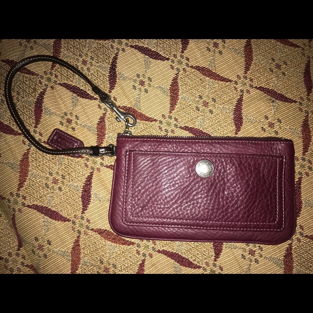 Coach burgundy large wristlet w/ outer &zip pocket